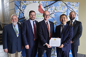 Transportation Operations and Fleet Manager Mike Duffy and UVA Professor Brian Park display the Governor’s Environmental Excellence Award they received at the April 9 Virginia Military Institute’s Environment Virginia Symposium.