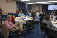 Several tables of community members attend UVA's Apprenticeship Summit