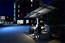 UVA students use the new solar table at night