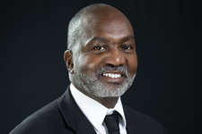 Headshot of Richard Barbour in suit and tie