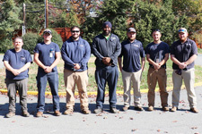 2021 UVA Apprenticeship Program graduates stand side by side in a row