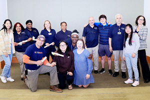 Group photo of English Language Learners and VISAS volunteers