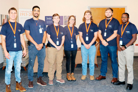 The newest class of UVA FM apprentices stand side-by-side