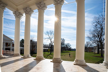 View of the Lawn through a pavilion's white columns