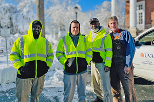 Facilities Management employees side-by-side in a snow-shoveled parking lot