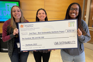 Students pose with oversized check.