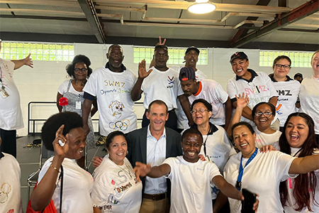 E&G Custodial Services team members pose with President Jim Ryan during the Custodial Olympics in August
