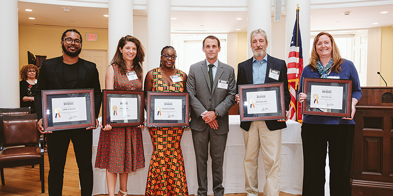 Group photo of Hoos Building Bridges award recipients with President Jim Ryan