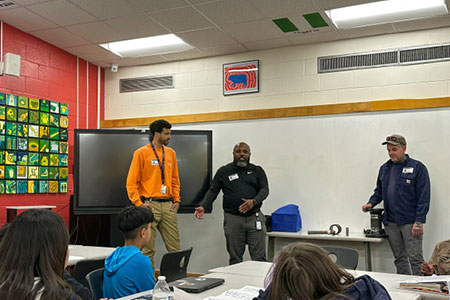 Energy & aUtilities staff members Marcus Klaton, Corey Jones and Kyle Bourne present to Journey Middle School students as part of the FM Community Connections Program. 