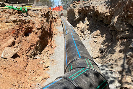 A trough dug for a utility line