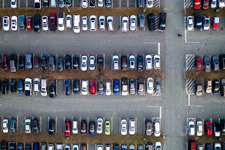 Birds-eye view of a parking lot full of cars