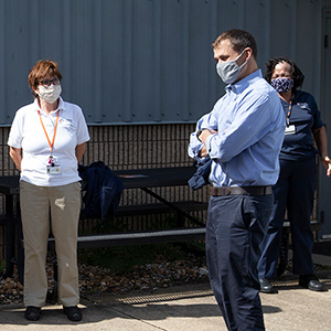 UVA President Jim Ryan meets with Custodial staff outdoors