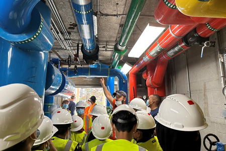 A tour of a maintenance room led by an FM employee