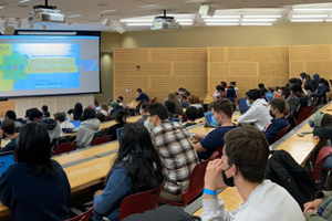 Wide shot of an auditorium hosting the HooHacks event