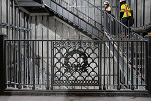 Cast iron panels line a stairway as part of the Alderman Library renovation