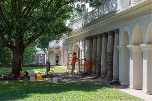 Facilities Management's historic masons restore the Tuscan columns in the colonnade between Pavilion VII and Pavilion IX