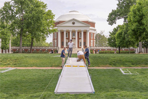 Workers place ramps for upcoming Final Exercises