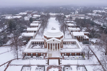Aerial view of the Rotunda and Lawn covered in snow