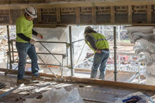 New capitals being unveiled by workers