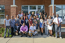 Attendees gather in front of Skipwith Hall for its dedication