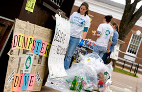 UVA students gathering recyclables during a dumpster dive event