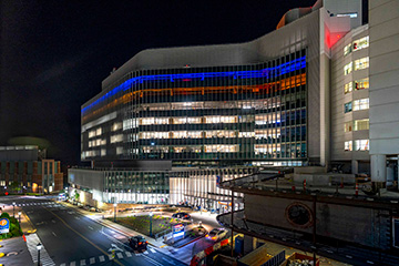 UVA Hospital's new wing addition, illuminated at night