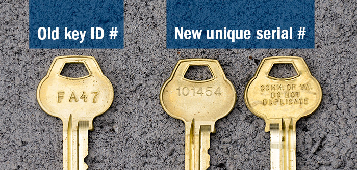 Photo of key with retired numbering system and keys with new serial numbers