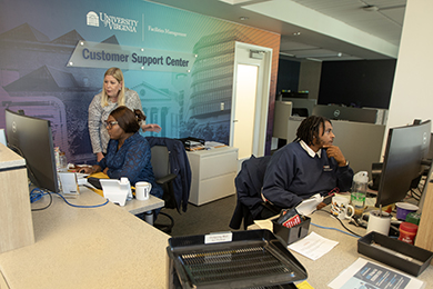 Customer Support Center employees talking with clients on phone